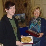 Rachel receives the Cherie Booth Salver and a memento from WFM Joy Durno.